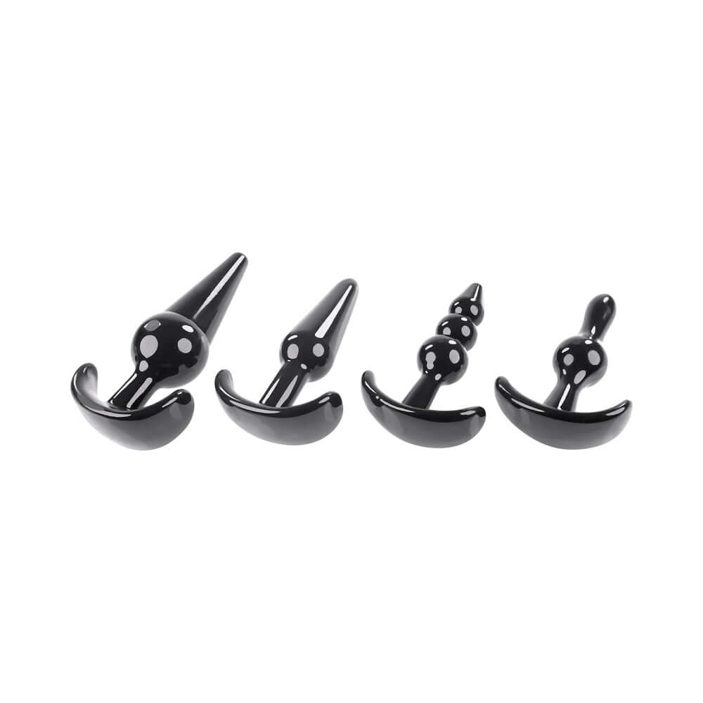 Selopa Intro To Plugs 4-Piece Anal Plug Set Black featuring four uniquely designed plugs for beginners.