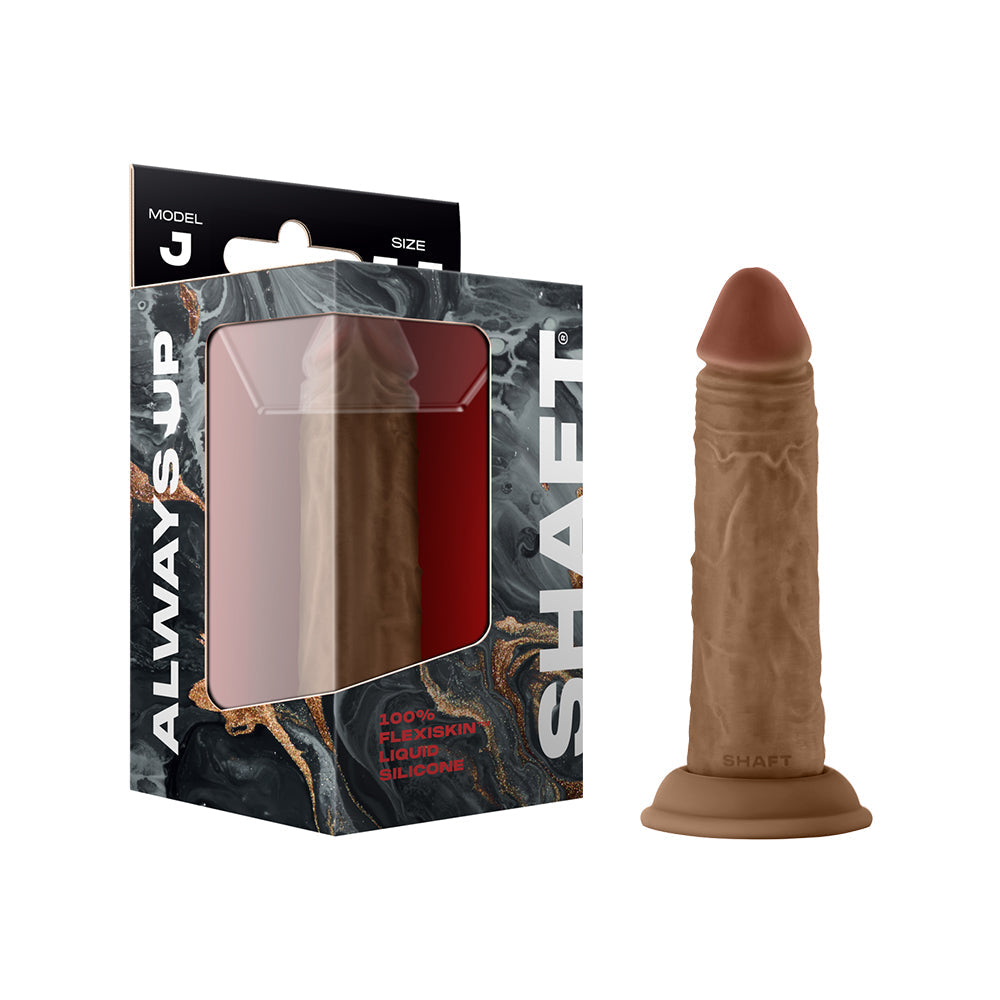 Shaft Model J 5.5 Inch Dual Density Silicone Dildo Oak with packaging on display.
