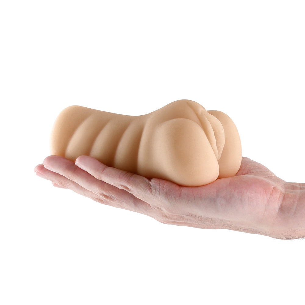 Barely Legal Gogo Realistic Stroker held in hand, showcasing its realistic texture and design for enhanced pleasure.