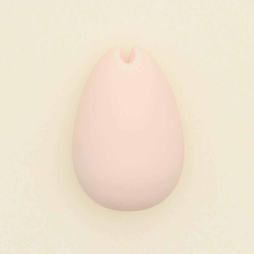 Tenga iroha SAKURA Massager in soft cherry-blossom pink color for soothing self-pleasure.