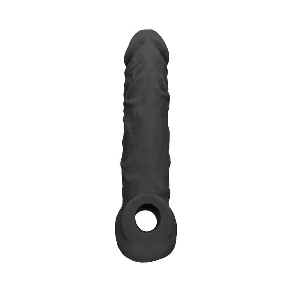 RealRock Skin 8 inches Penis Extender Sling Black shown from the front, highlighting its lifelike texture and color.