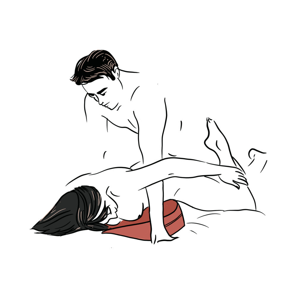 Couple using the Liberator Heart Wedge Red for enhanced comfort and pleasure during intimate moments.