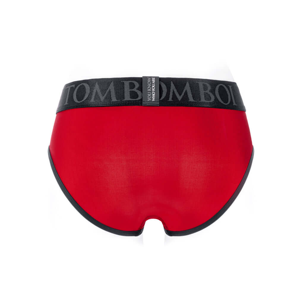 SpareParts Tomboi Cover Brief Style Underwear Harness Red L shown from the back, featuring a sleek red design and black waistband.