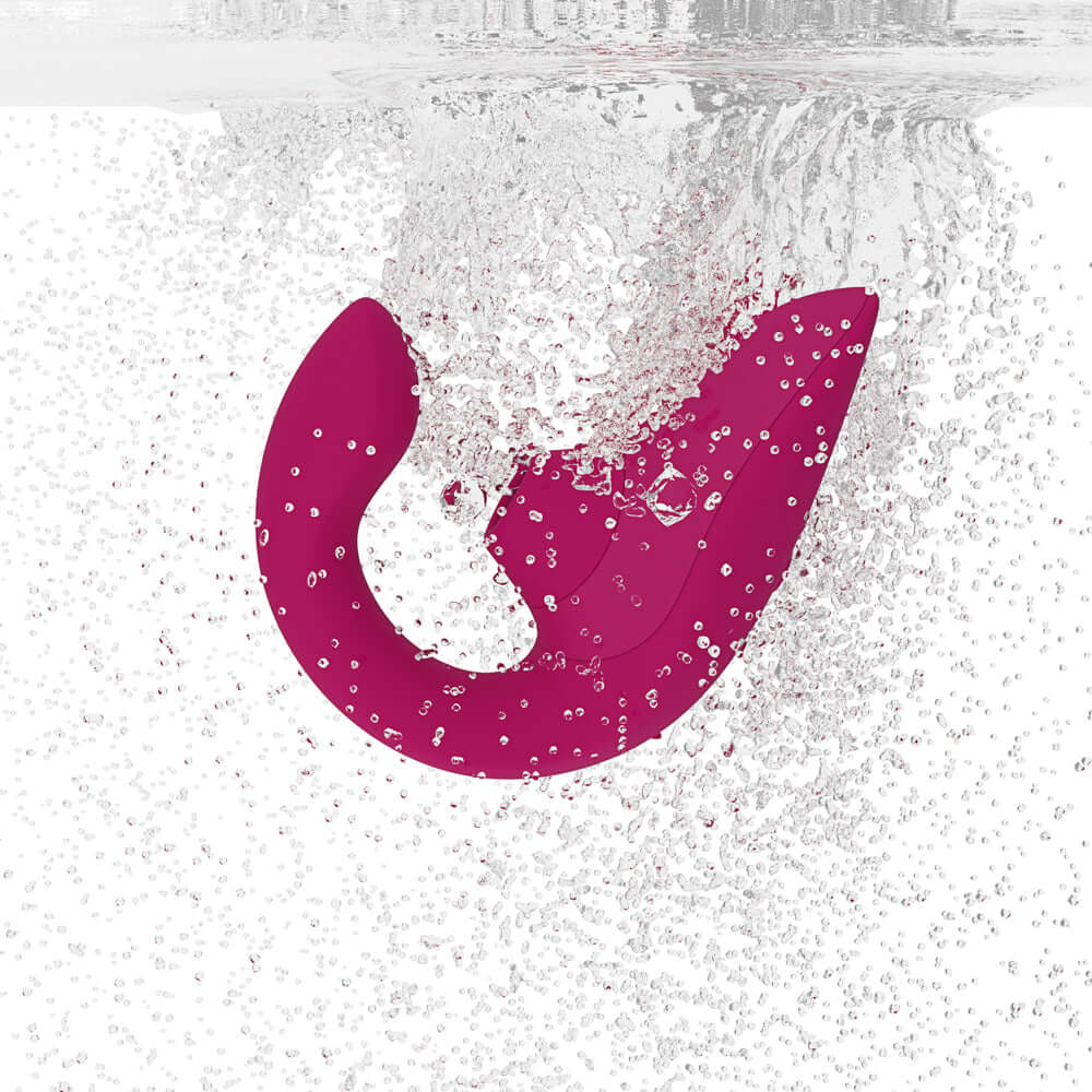 Womanizer Blend Rechargeable Silicone Vibrator with Clitoral Stimulator - Vibrant Pink