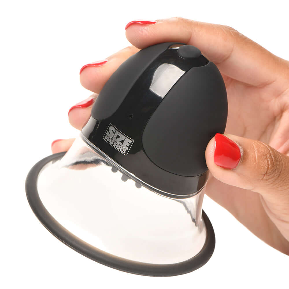 Size Matters 10X Rotating Nipple Suckers with 4 Attachments held in a hand, showcasing the sleek design.