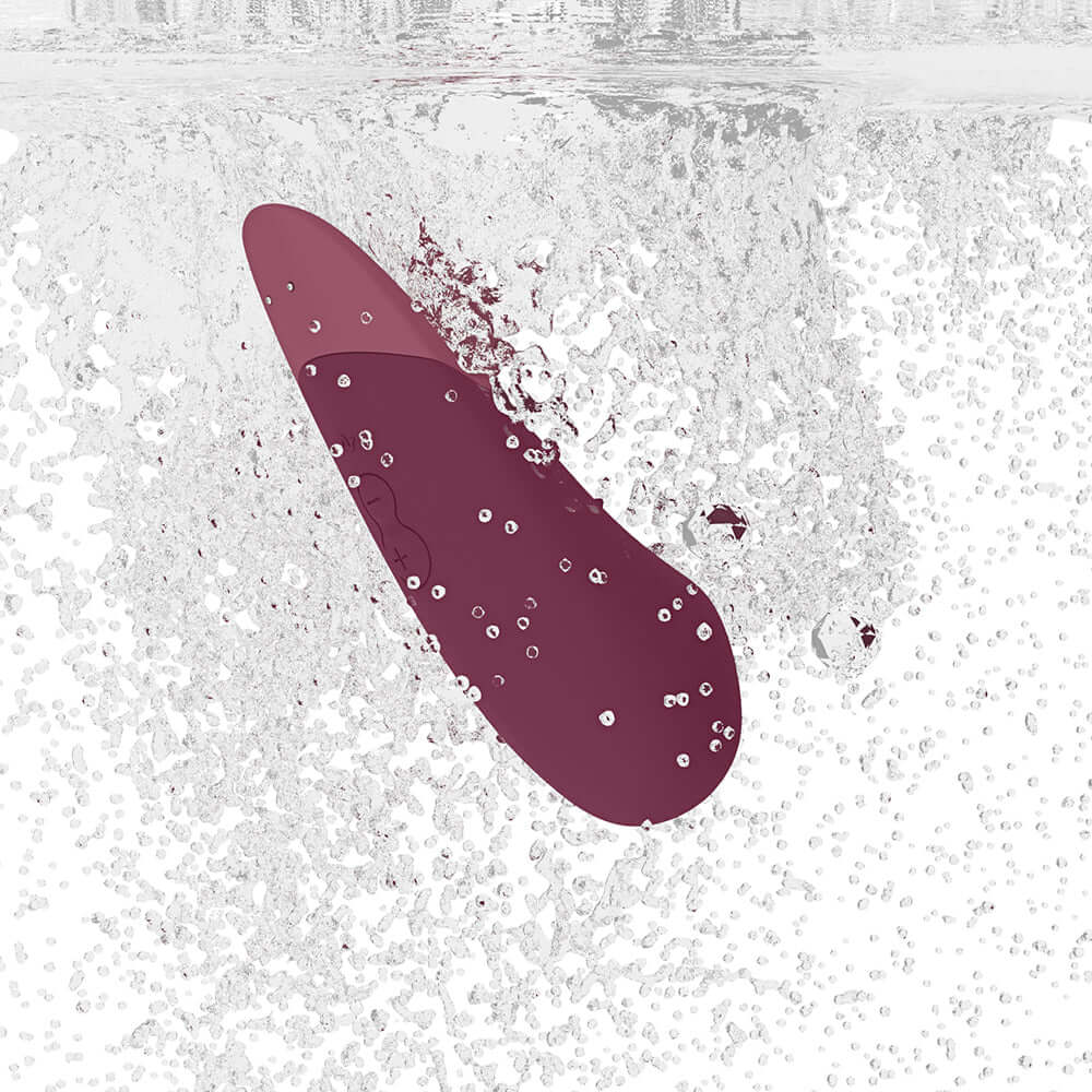 Womanizer Vibe Rechargeable Silicone Clitoral Vibrator - Dusky Pink