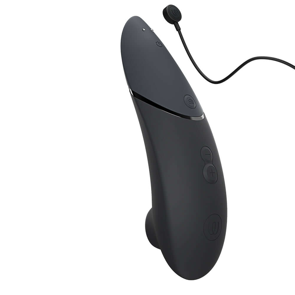 Womanizer x We-Vibe Lust and Luxury Collection Black device featuring sleek design and advanced pleasure technology.