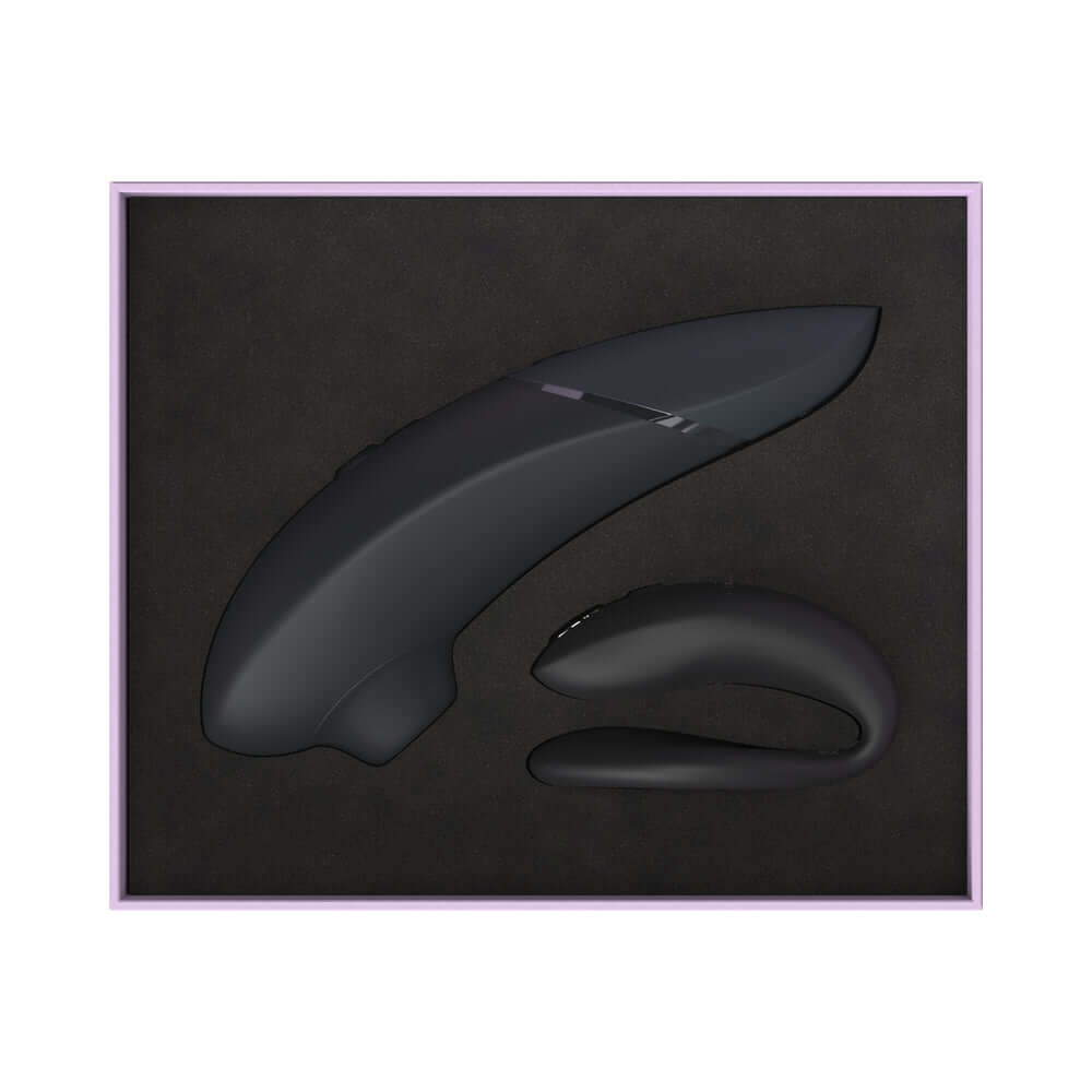 Womanizer x We-Vibe Lust and Luxury Collection Black featuring two premium devices in elegant black packaging.