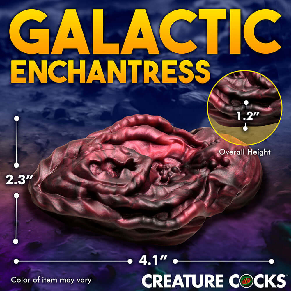 Galactic Enchantress alien silicone grinder with textured design, 4.1 inches wide and 2.3 inches tall for unique pleasure.