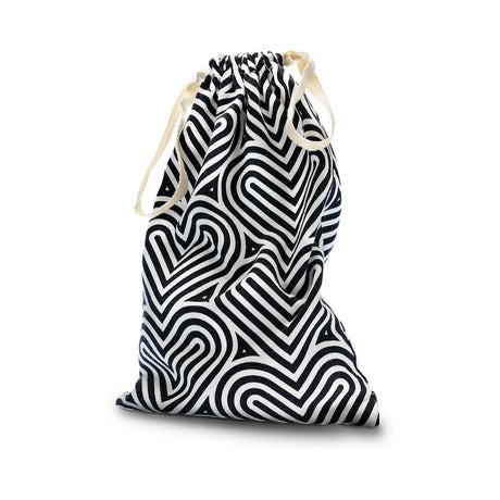 The Collection Bomba Cotton Toy Bag featuring a stylish black and white heart pattern for organized storage.
