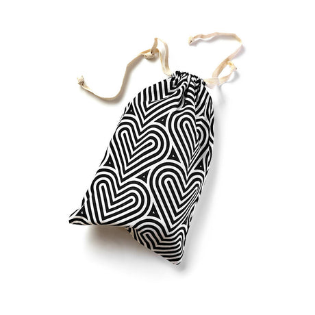 The Collection Bomba Cotton Toy Bag featuring a stylish heart pattern for discreet toy storage.