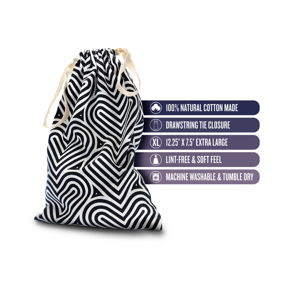 The Collection Bomba Cotton Toy Bag featuring a drawstring closure and heart design, perfect for storing toys and accessories.