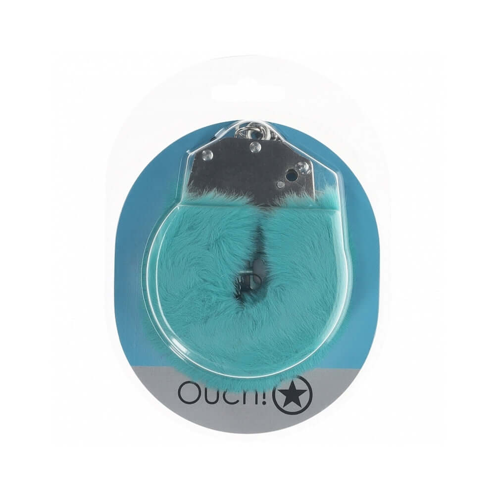 Ouch Heavy-Duty Fluffy Handcuffs Blue in packaging, showcasing a soft fluffy exterior and metallic parts.