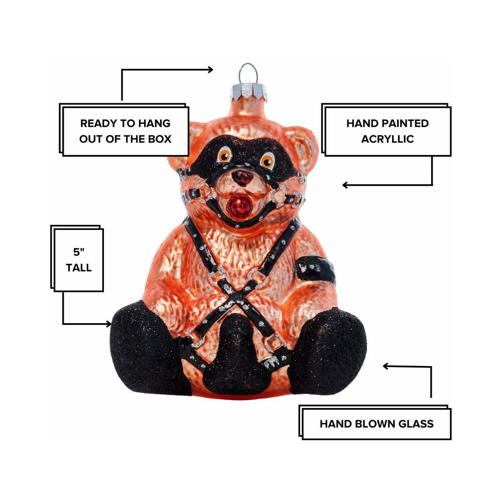 Cheeky Pornament Ready Teddy ornament featuring a playful raccoon design, hand-blown glass, and intricate details.