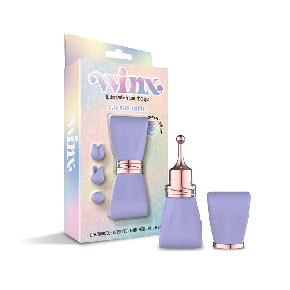 Image of Winx Gogo Bow Pinpoint Massager With Attachments in packaging, showcasing the massager and silicone attachments.