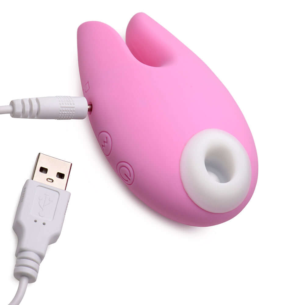 Shegasm Sucky Bunny Clitoral Stimulator Pink, cute design with USB charging and buttons for adjustable settings.
