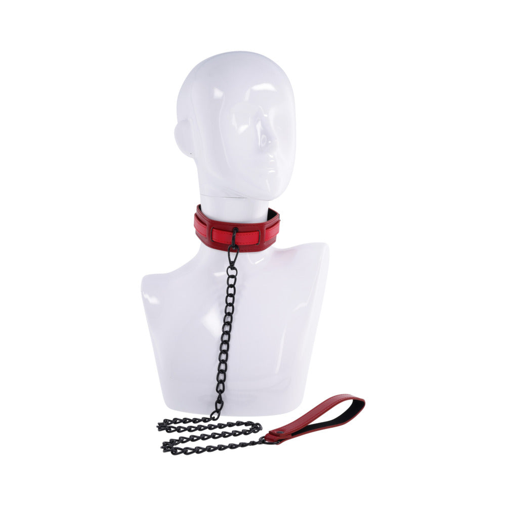 Sportsheets Sex and Mischief Exs & Ohs Collar and Leash on a mannequin displaying a deep red faux leather design.