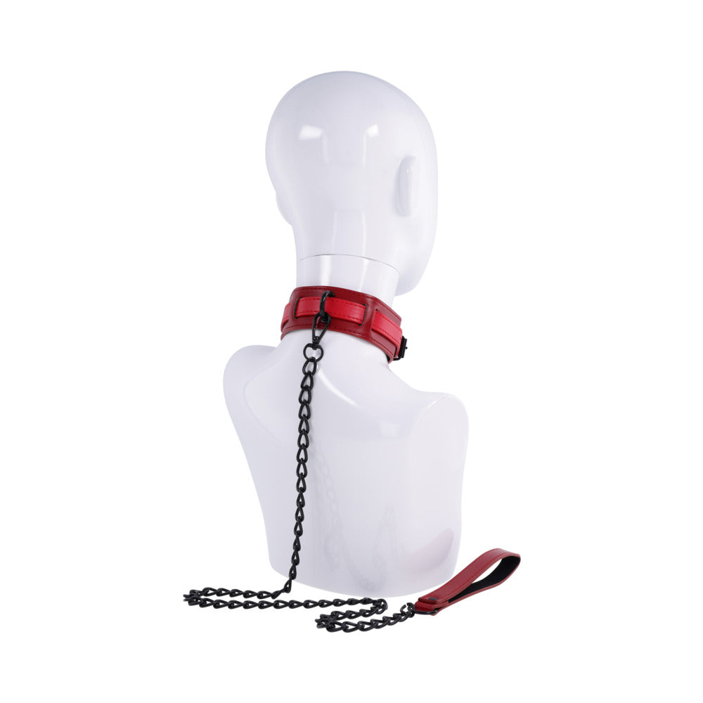 Sportsheets Sex and Mischief Exs & Ohs Collar and Leash displayed on a mannequin, featuring a red faux leather collar and leash.