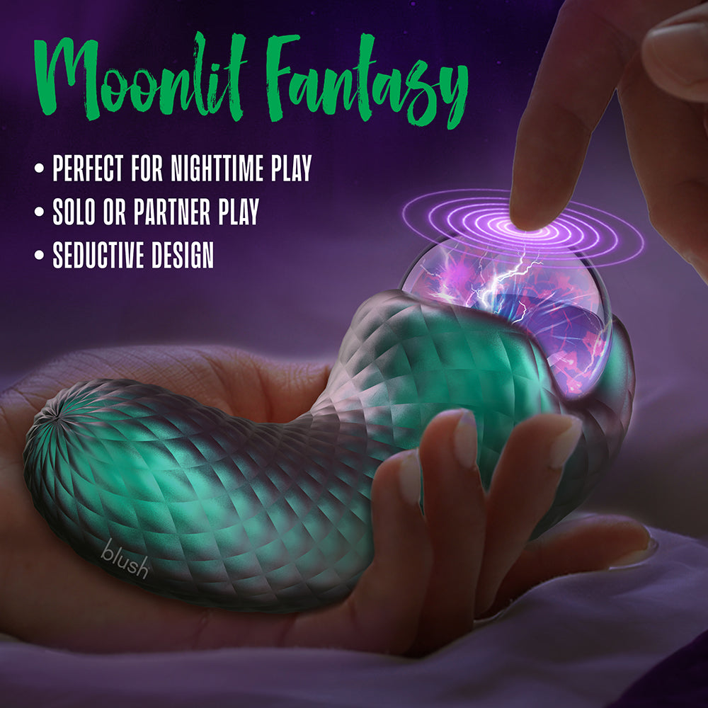 Temptasia Enchanted Serpent Dark Millenia Pulse Vibrator glowing with captivating design, ideal for nighttime play.