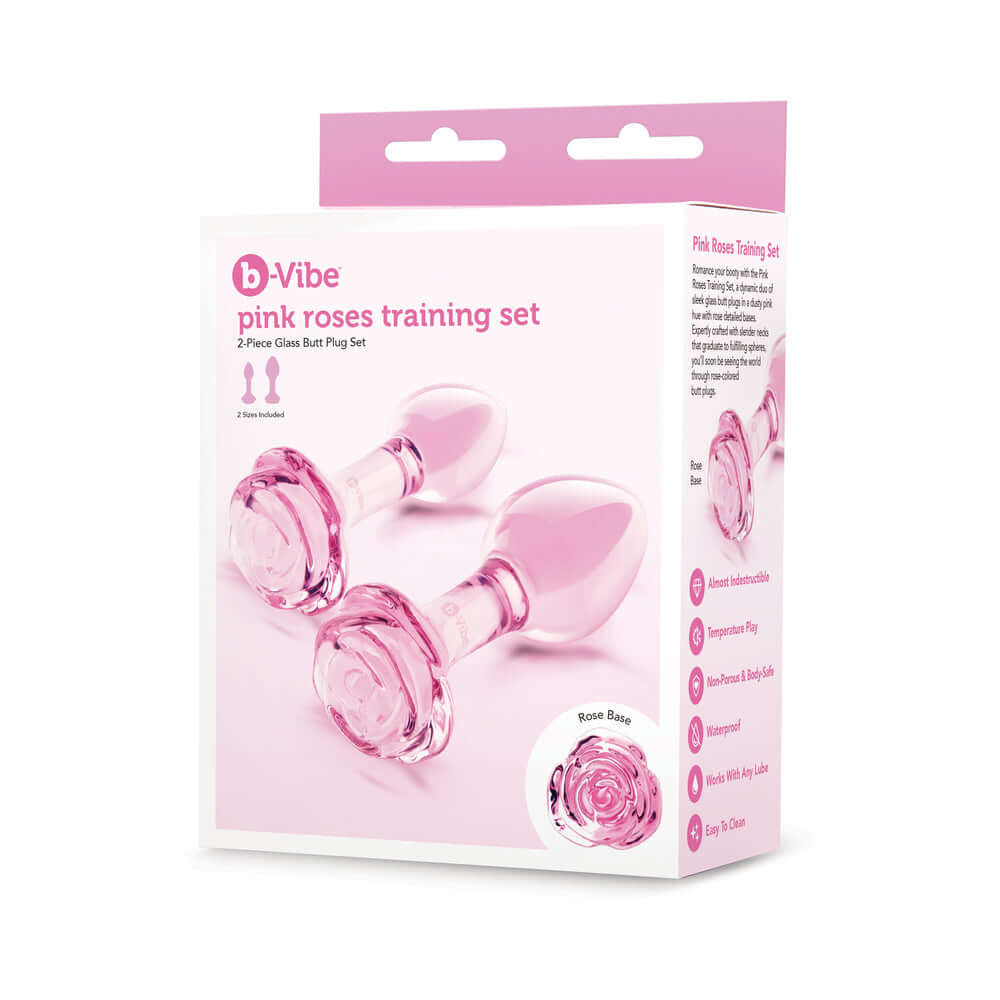 b-Vibe Glass Pink Roses Training Plug Set with two glass butt plugs in a pink box featuring rose-detailed bases.