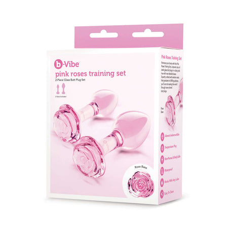 b-Vibe Glass Pink Roses Training Plug Set with two glass butt plugs in a pink box featuring rose-detailed bases.