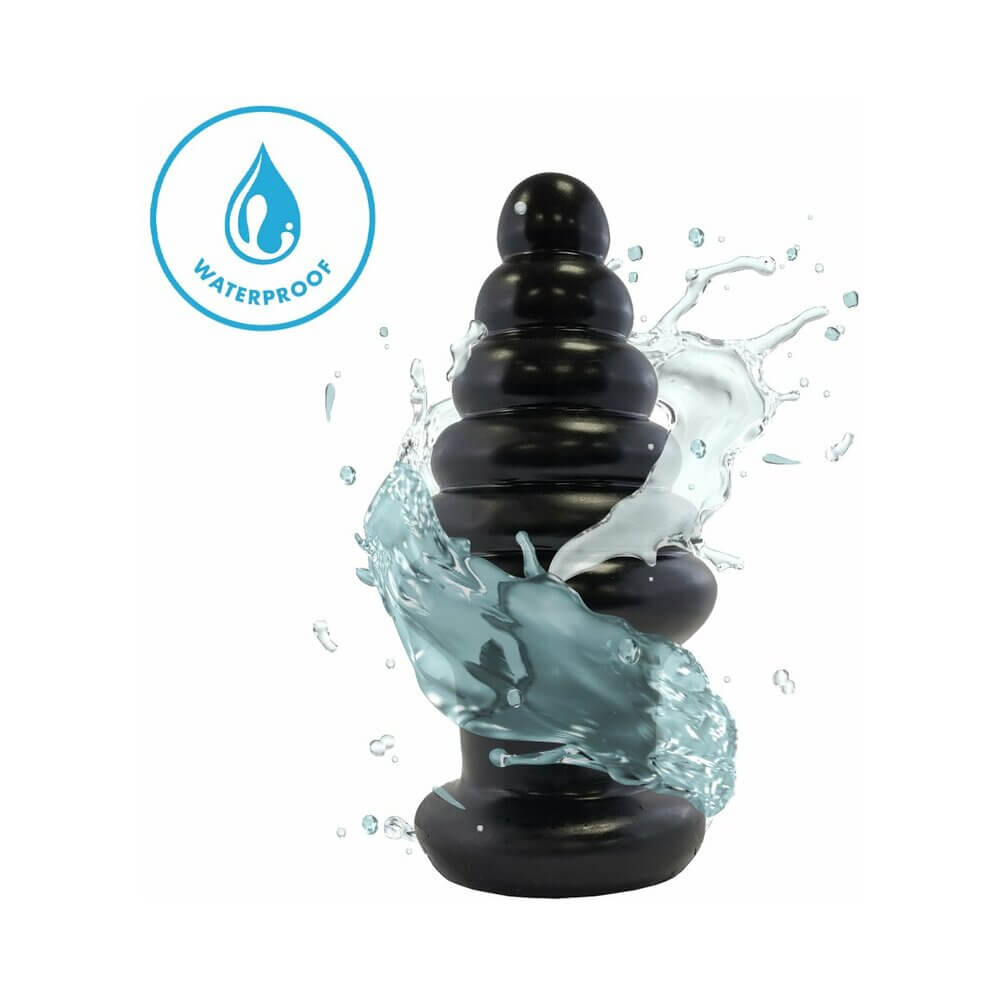 Prowler RED Twisted Tease Anal Plug Black showcased with waterproof feature and splashing water effect.
