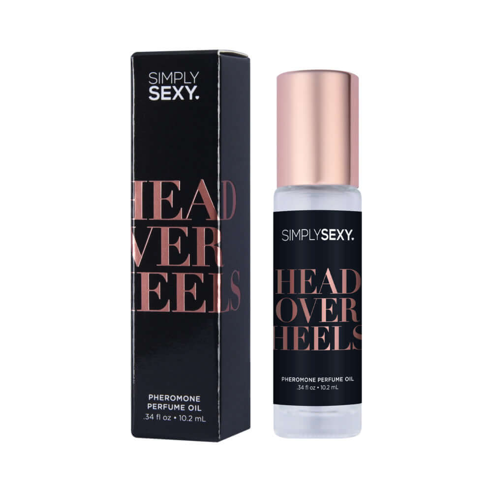 Simply Sexy Pheromone Perfume Oil Roll-On Head Over Heels 0.34 Oz in packaging and bottle display.