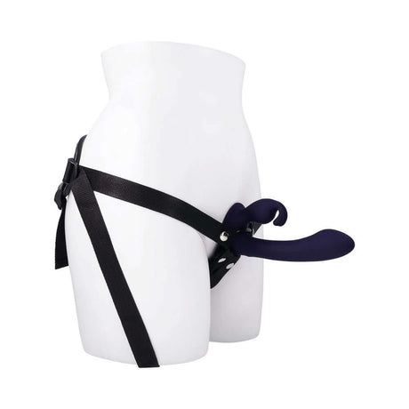 Evolved Giving Vibes Strap On Purple showcasing its design with a chisel-tip shaft and bunny-eared stimulator.