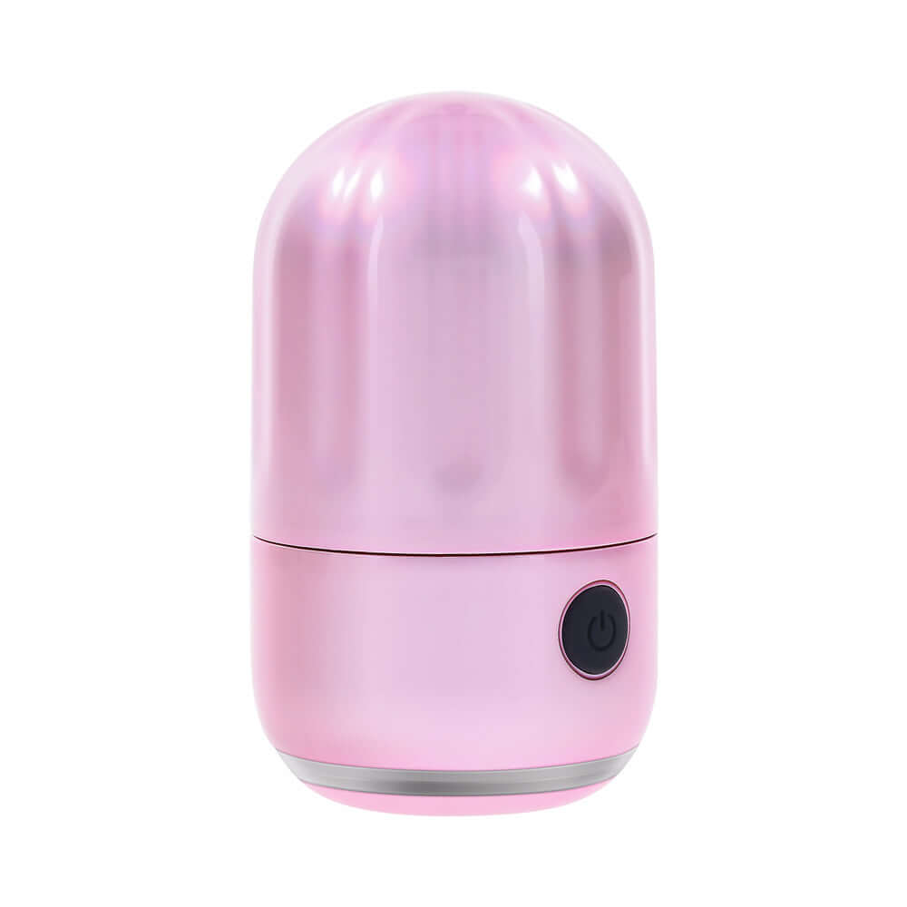 Evolved Vacation Vibes Vibrating Massager Pink Black in a shiny pink canister with a textured lid.