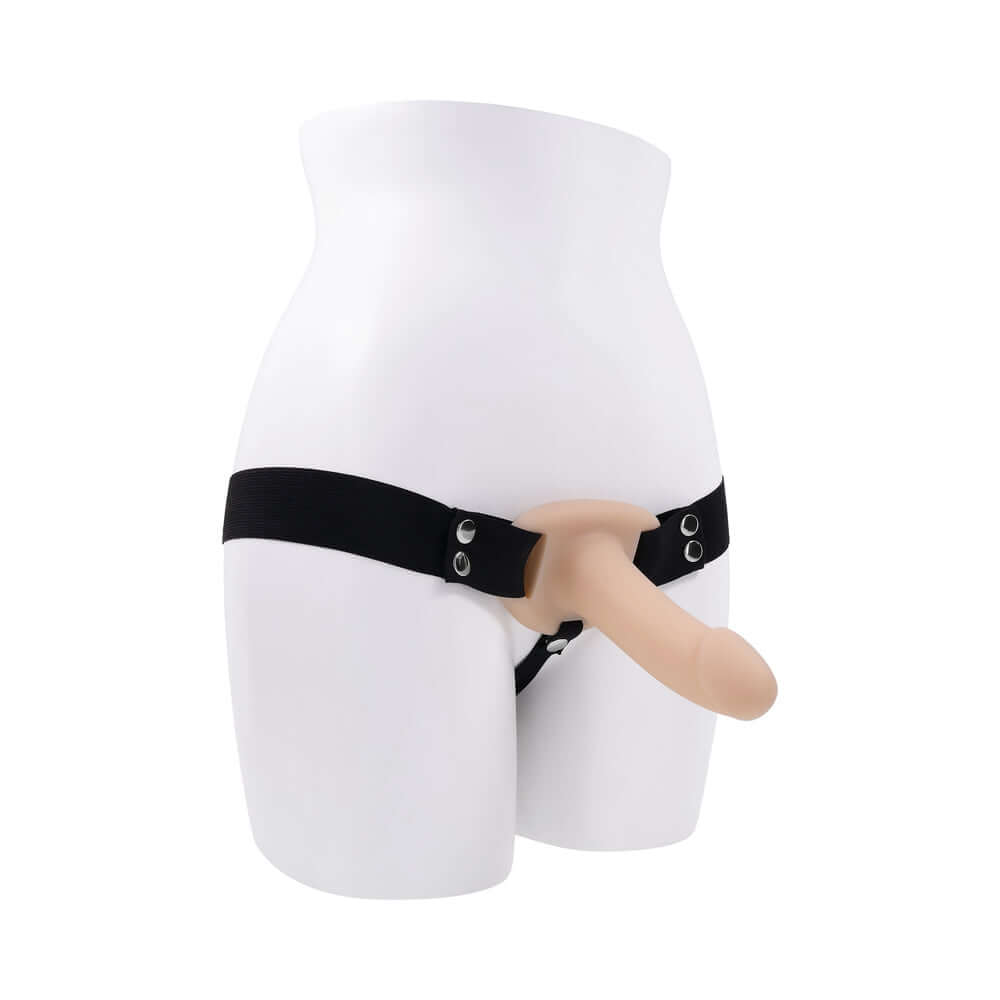 Selopa Our First Hollow Strap-On Light displayed on a mannequin, featuring a smooth hollow dildo and adjustable strap.