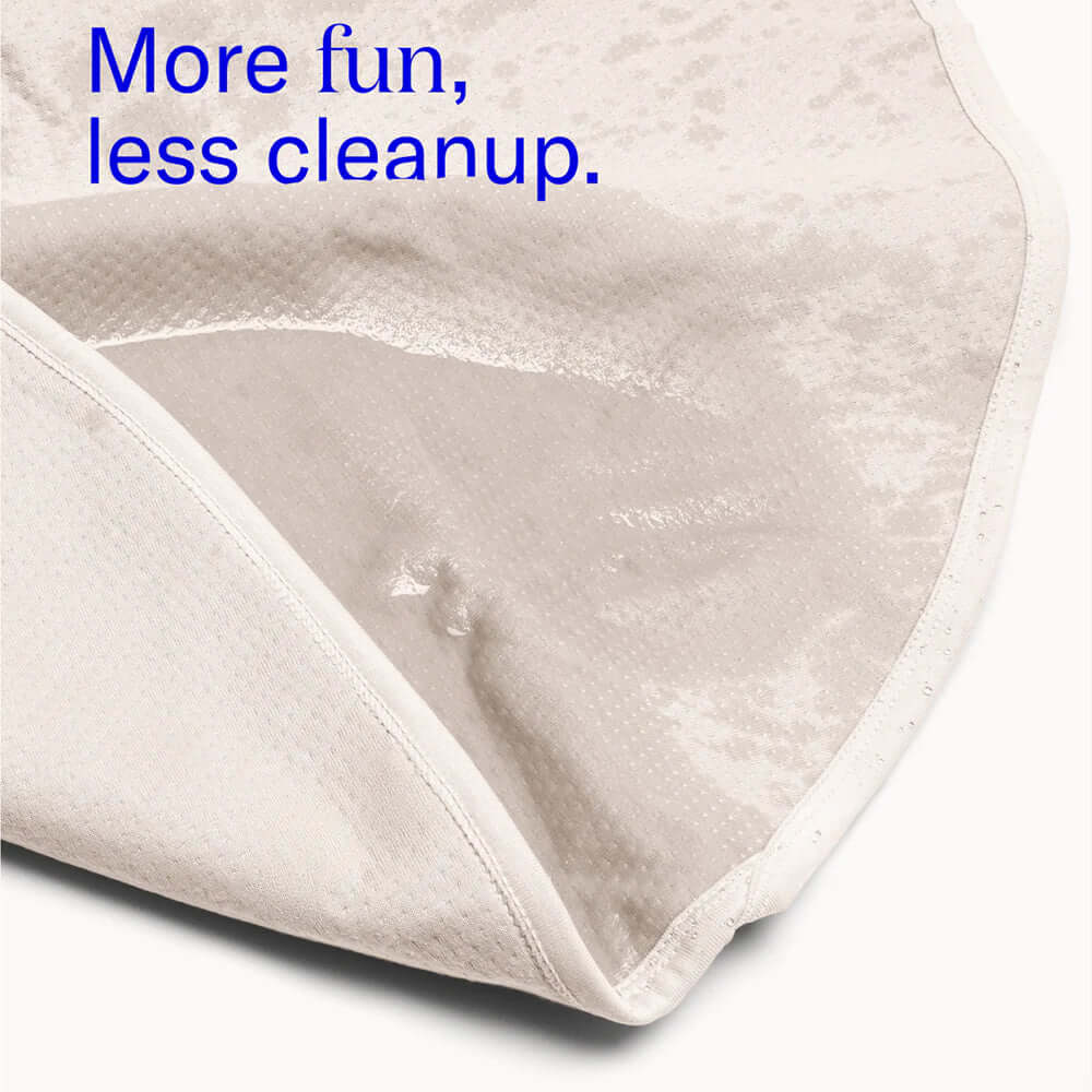 Dame Thro Waterproof Sex Blanket Oat showing soft, waterproof interior for easy cleanup and comfort during intimate moments.