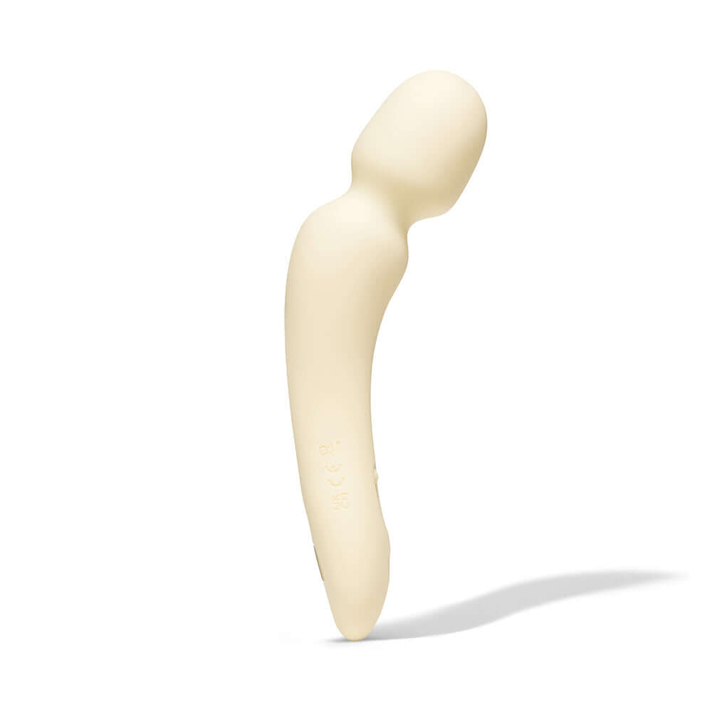 Dame Min Mini Wand Vibrator Butter with a smooth silicone design for deep vibrations.