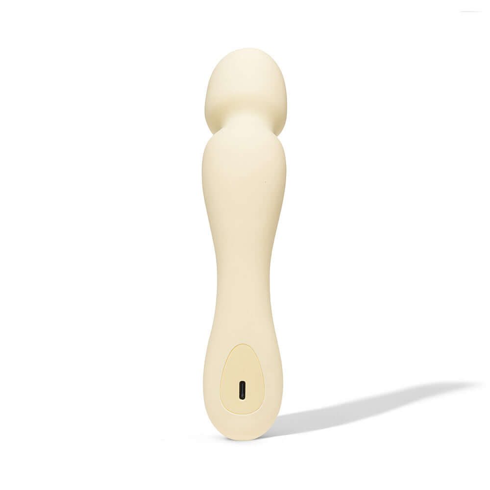Dame Min Mini Wand Vibrator Butter in a soft ivory color showcasing its sleek design and silicone head.