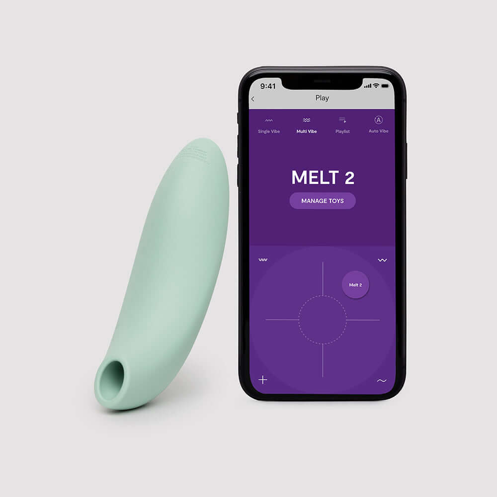 We-Vibe Melt 2 Pleasure Air Clitoral Stimulator Sage with accompanying app on smartphone