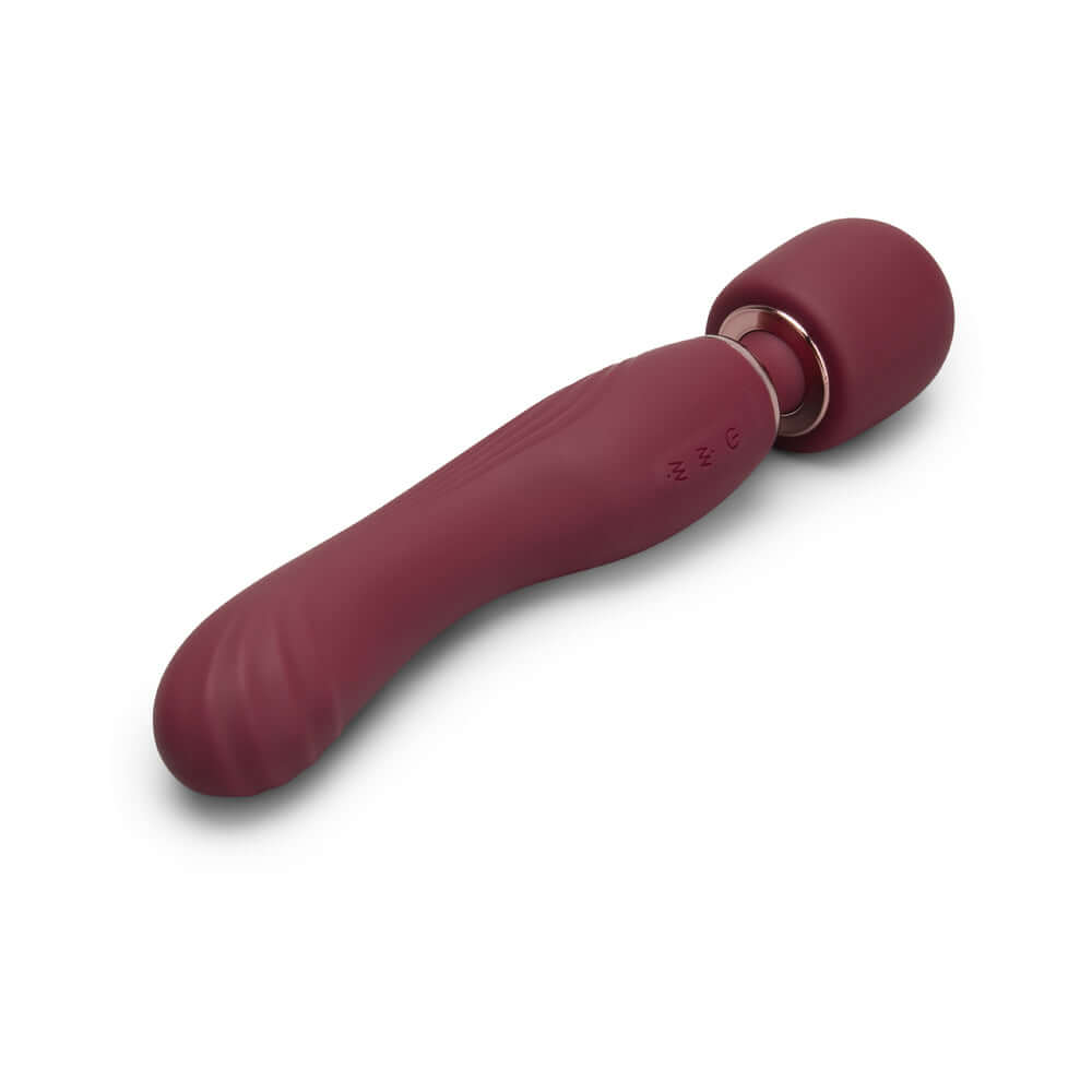 Le Wand Flat Top Fusion G Double-Ended Petite Wand Vibrator in burgundy with textured grip and rounded head for precise stimulation.