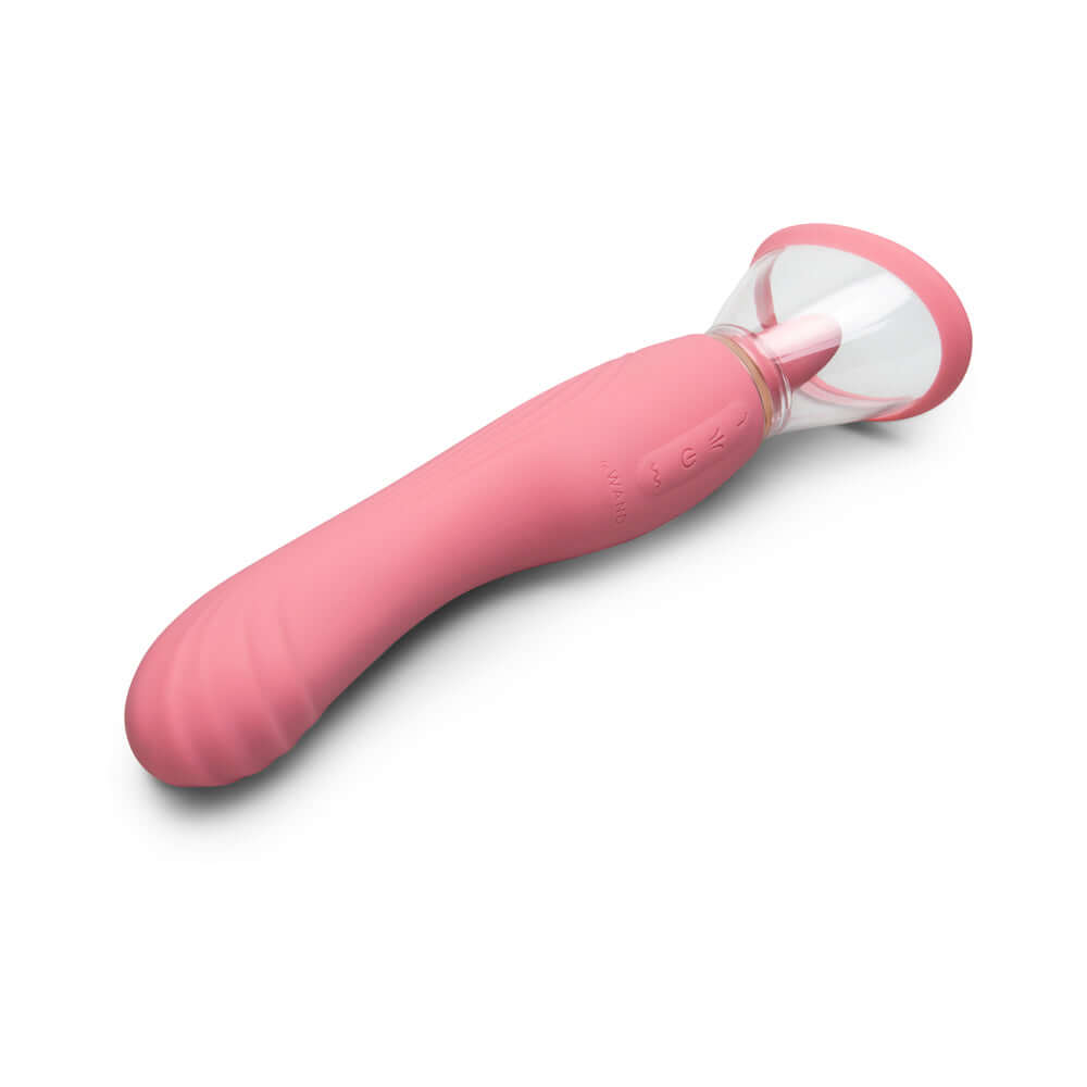 Le Wand Lick Double Ended Vibrator in soft pink silicone with a unique design for pleasure.
