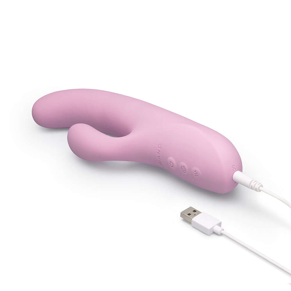 Le Wand Hither Rocking Rabbit Vibrator, a pink dual-stimulation toy for luxurious pleasure.