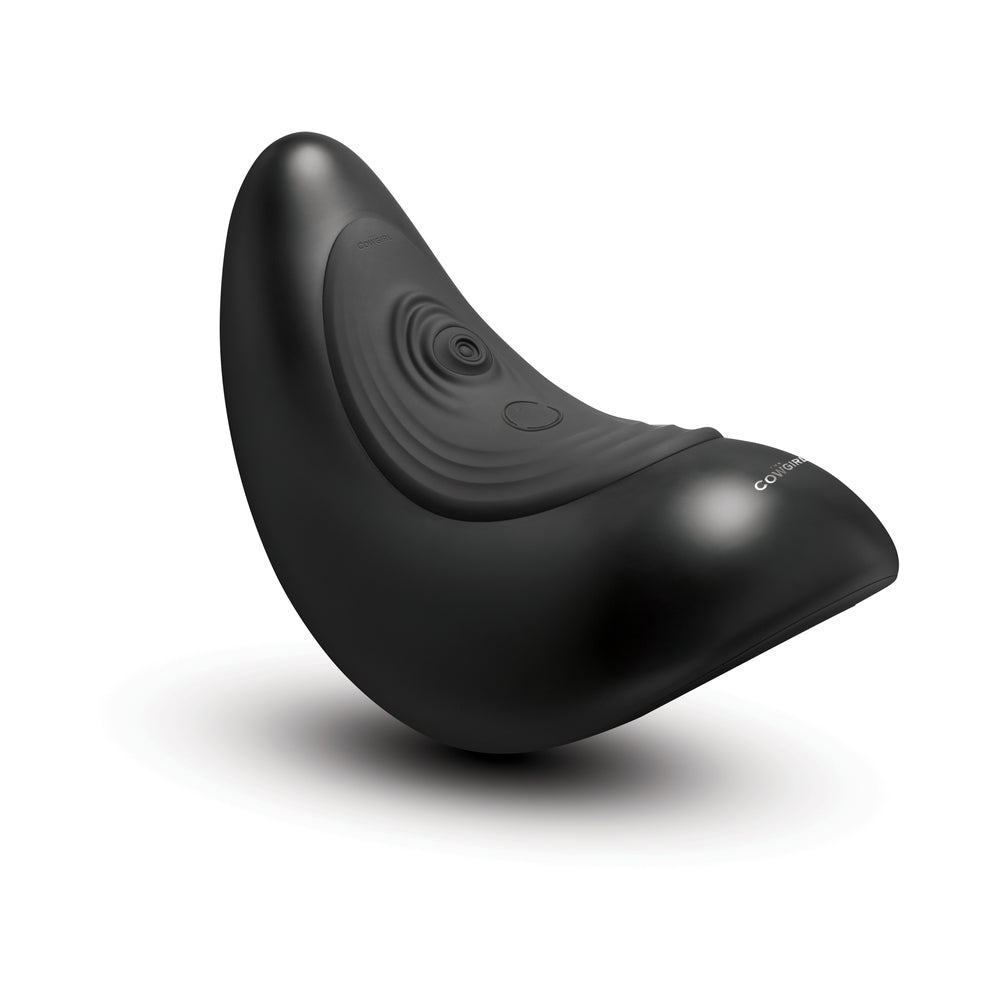 The Cowgirl Saddle Machine Black ergonomic design in sleek black finish, showcasing its unique shape and functionality.