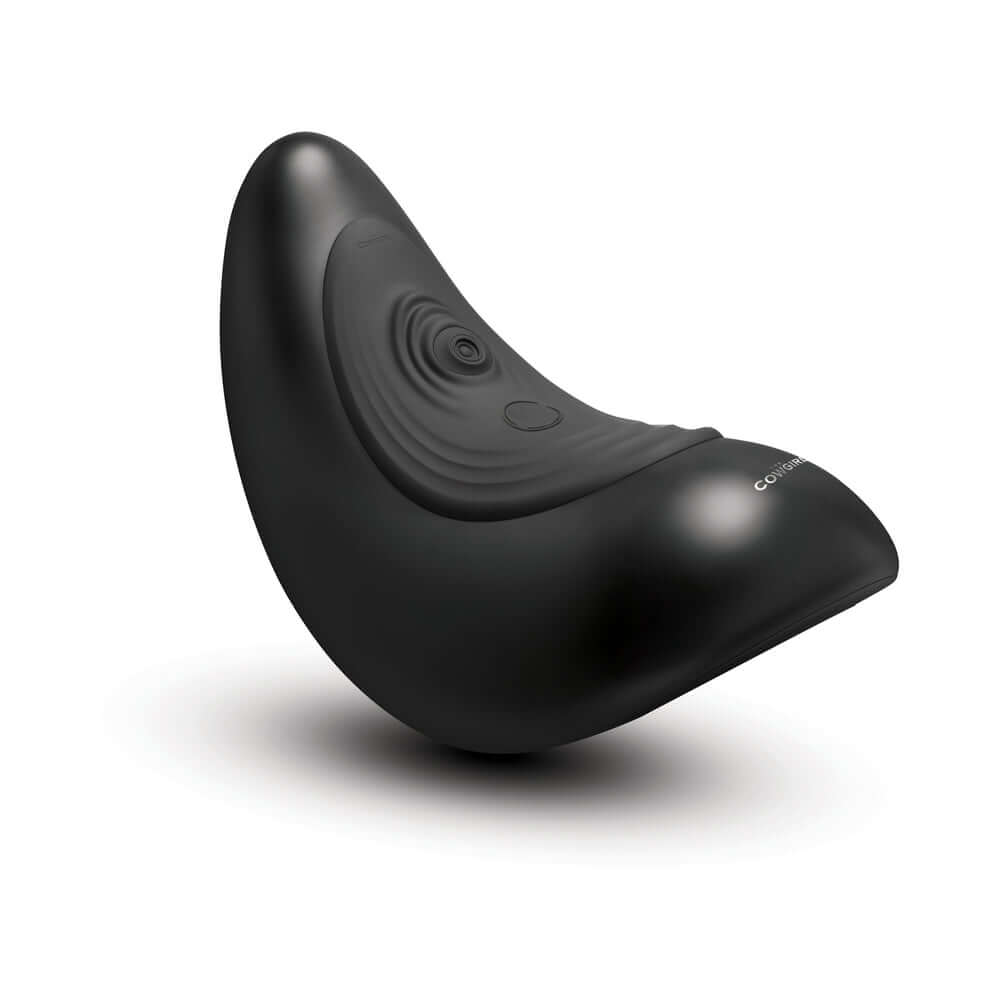 The Cowgirl Saddle Machine Black ergonomic design in sleek black finish, showcasing its unique shape and functionality.