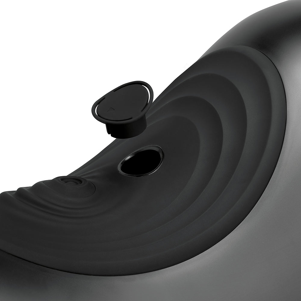 Close-up of The Cowgirl Saddle Machine Black, showcasing the sleek black design and unique contours.