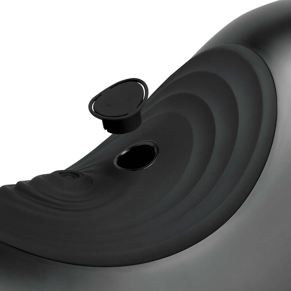 Close-up of The Cowgirl Saddle Machine Black, showcasing the sleek black design and unique contours.