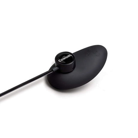 The Cowgirl Saddle Machine Black attachment with sleek design and control button.