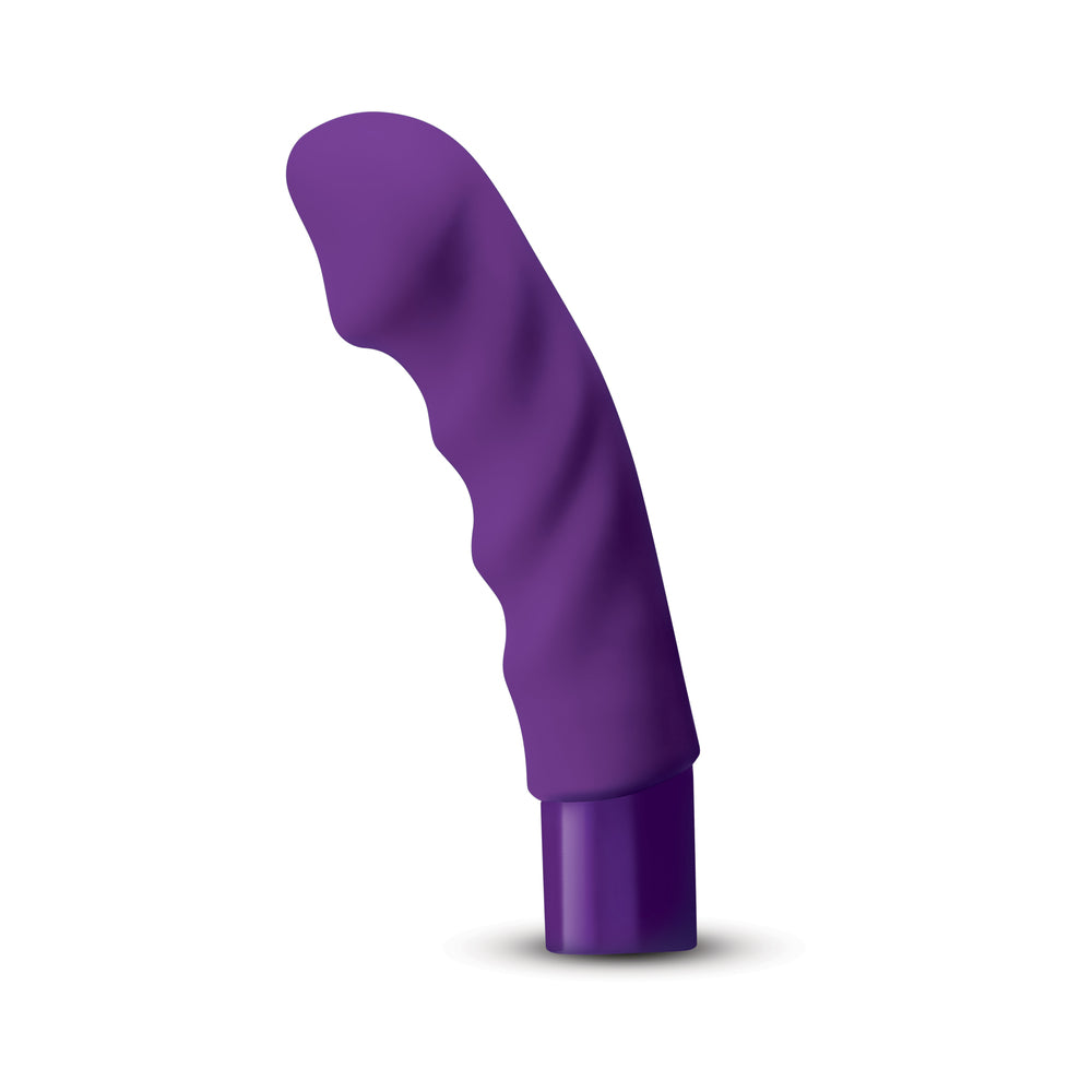 The Cowgirl Saddle Machine Black, a purple pleasure product with a textured design for enhanced stimulation.