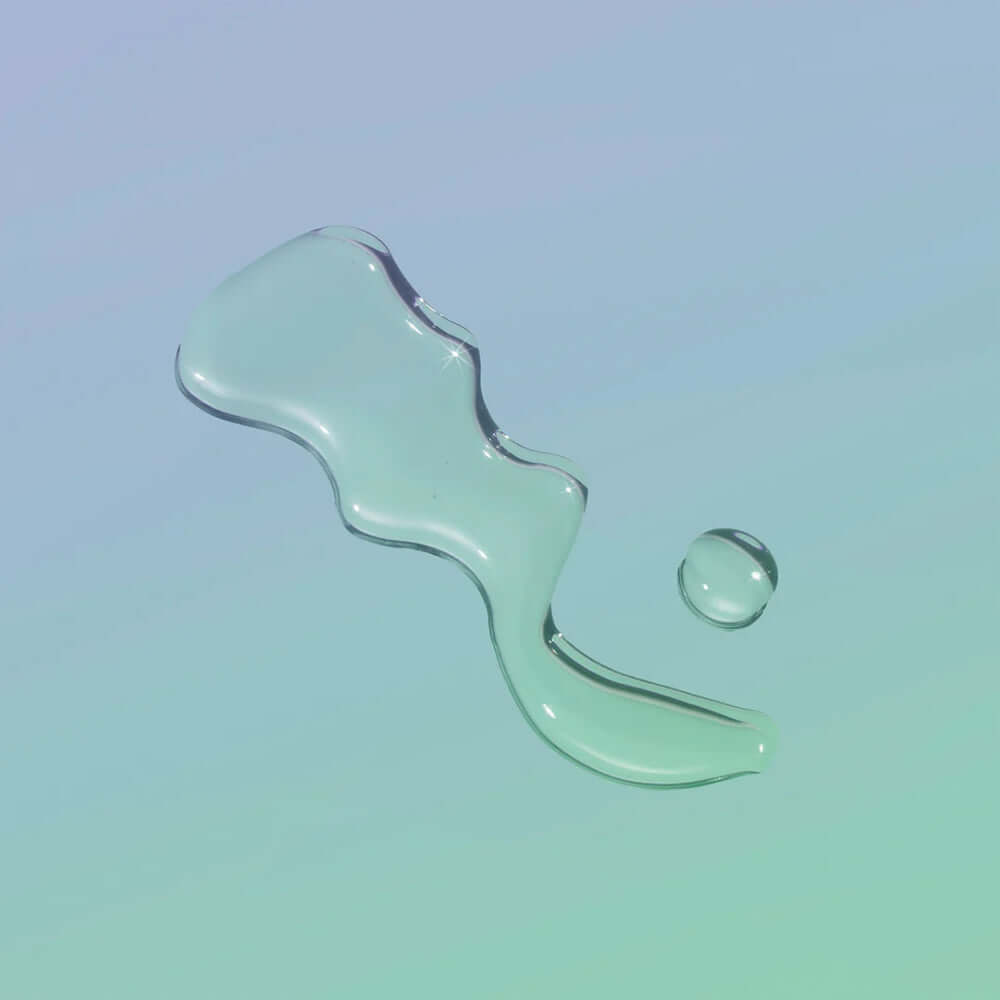 Playground Free Love Water-Based Personal Lubricant 3.7 Oz, clear lubricant droplet on light background.