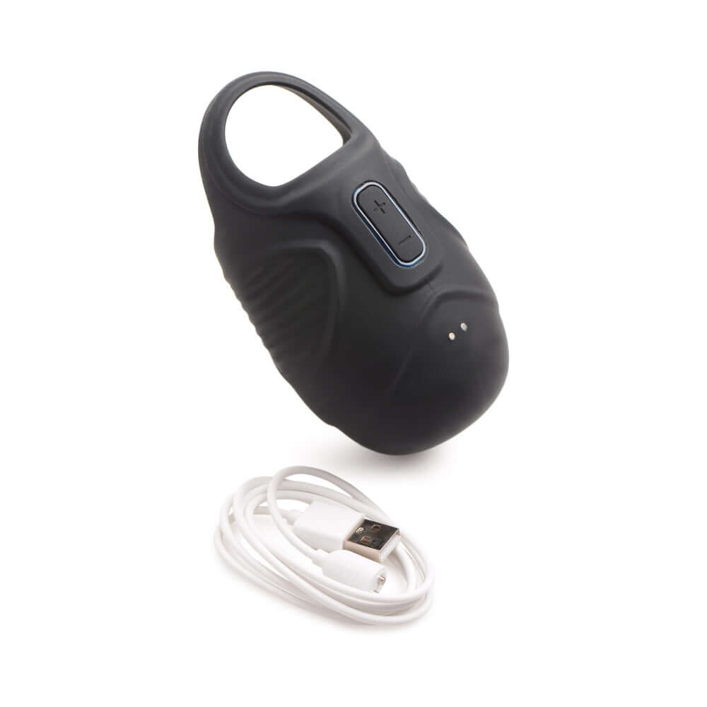 Trinity Men 7X Vibrating Silicone Ball Sack with USB charging cable, designed for powerful testicular stimulation.