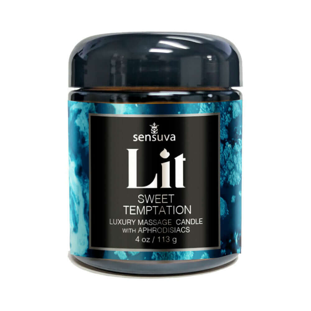 Sensuva Lit Sweet Temptation Luxury Massage Candle 4 Oz in a decorative jar with a blue design.