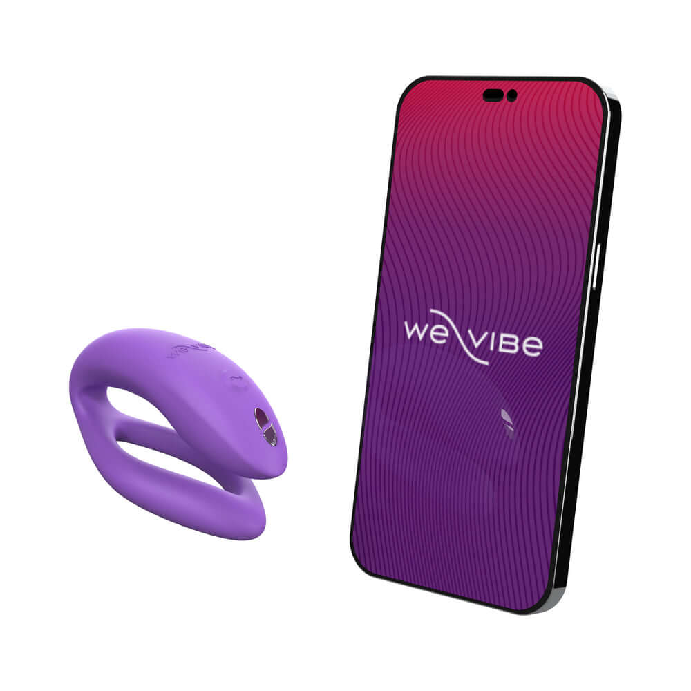 We-Vibe Sync O Vibrator Light Purple next to smartphone with We-Vibe app display.