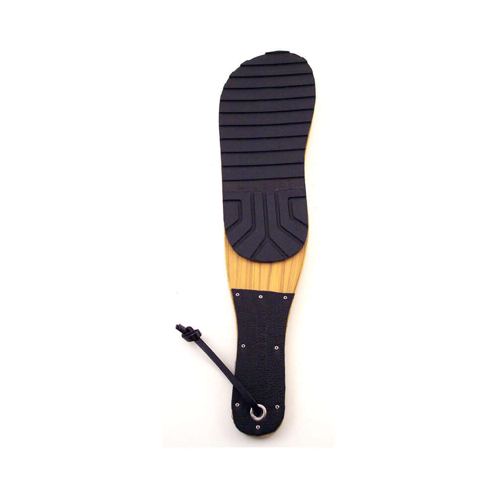 Rouge Shoe Paddle Black, a unique spanking tool shaped like a shoe, ideal for BDSM impact play.