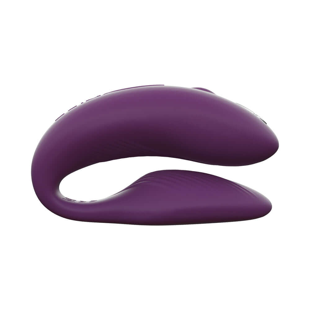 We-Vibe Chorus Couples Vibrator Purple side view showcasing its ergonomic design and sleek purple finish.