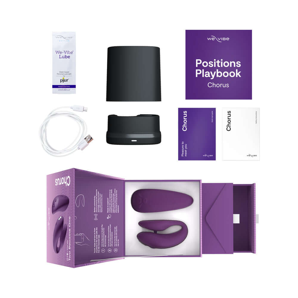 We-Vibe Chorus Couples Vibrator Purple and accessories including lube, charging cable, and positions playbook.